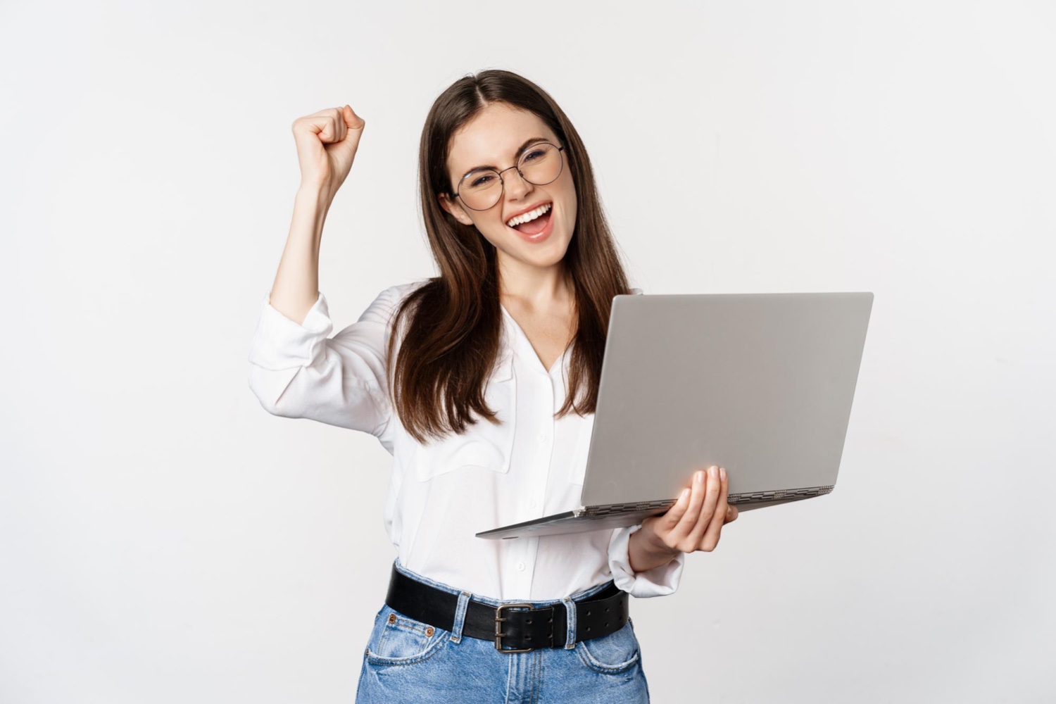 Enthusiastic business woman with laptop who just found her dream career