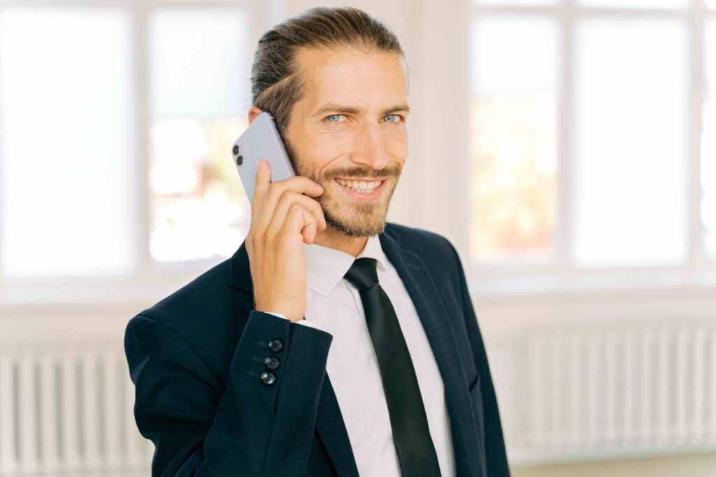 Happy business man on the phone with a great work-life balance