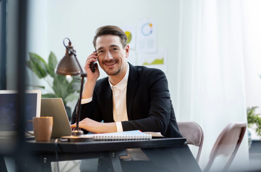 Smiling man talking on phone