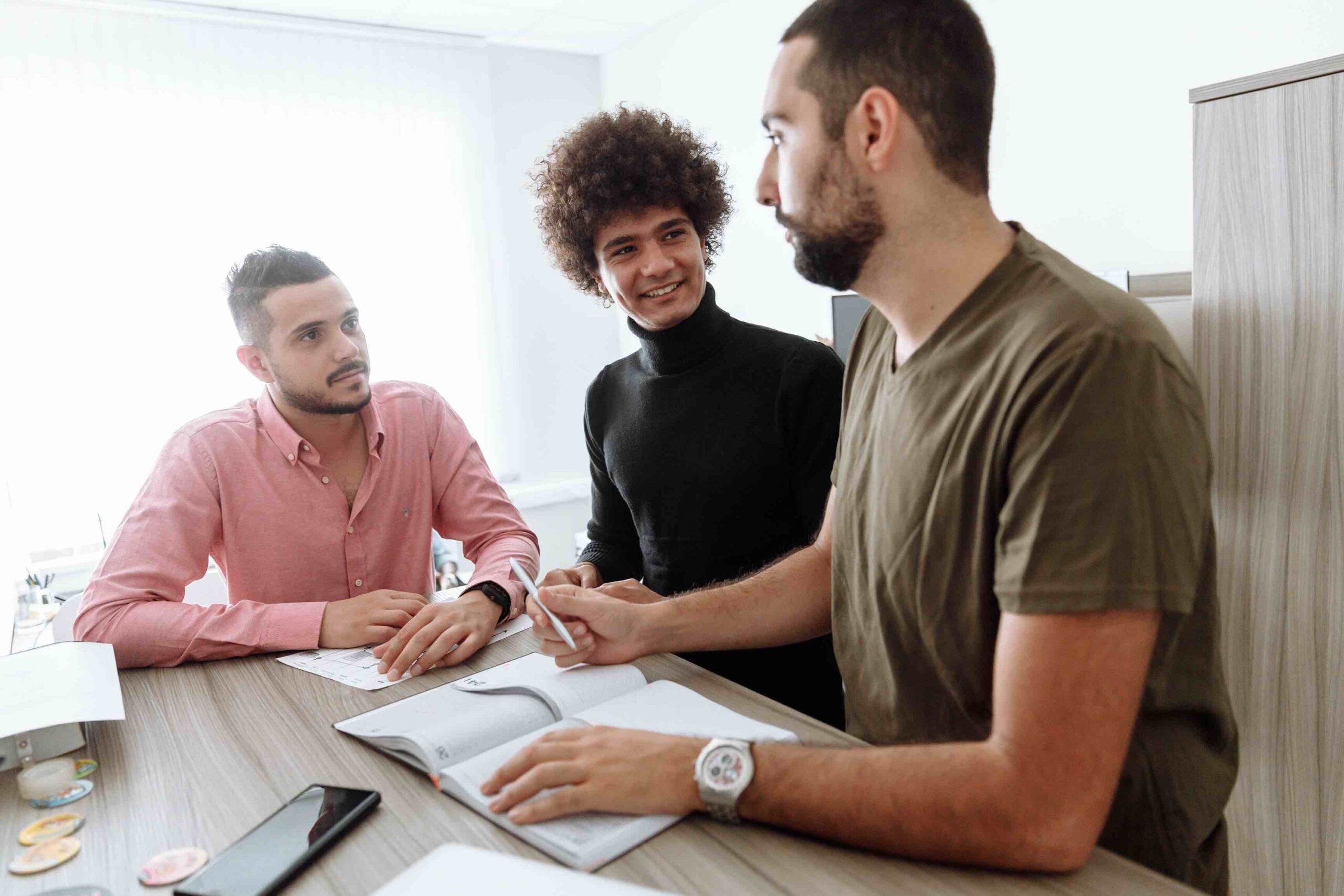 Team of human resources professionals during a work meeting talking about employment law