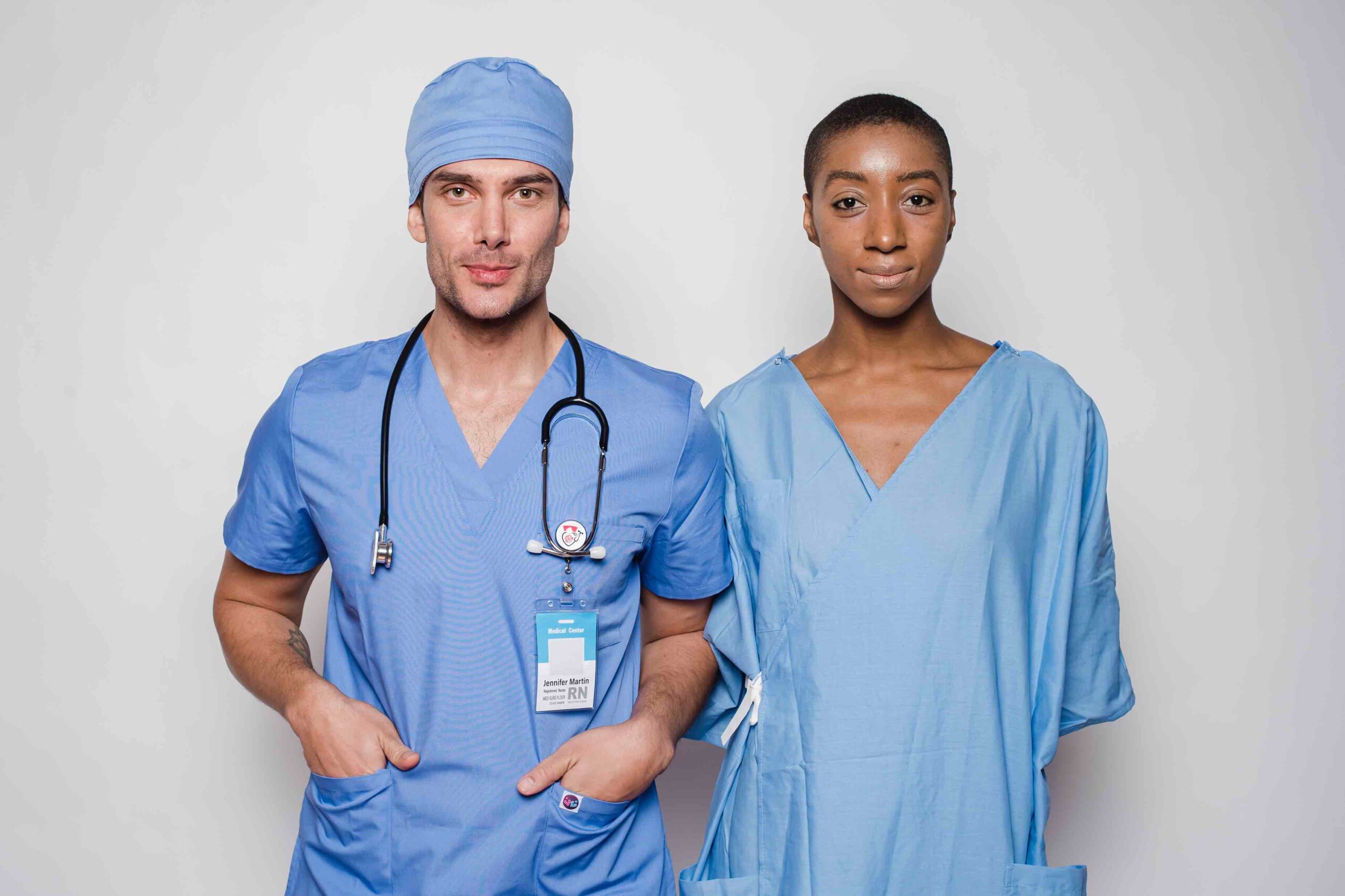 Two nurses in the intensive care unit in work clothes before the start of their shift