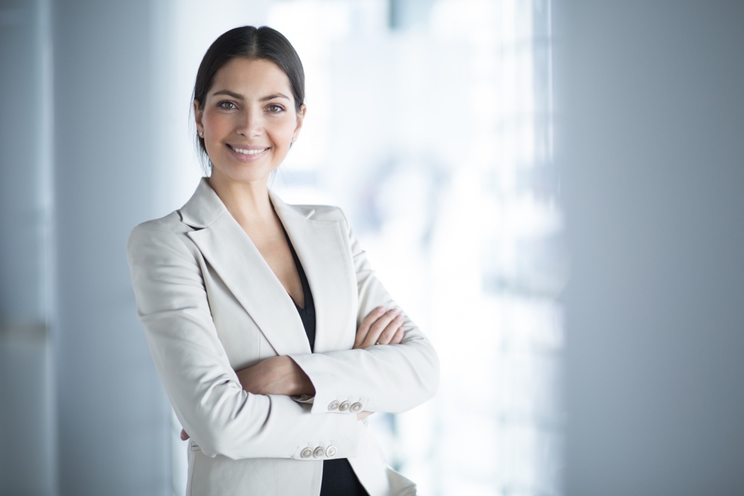 Smiling female business leader who knows about different management styles