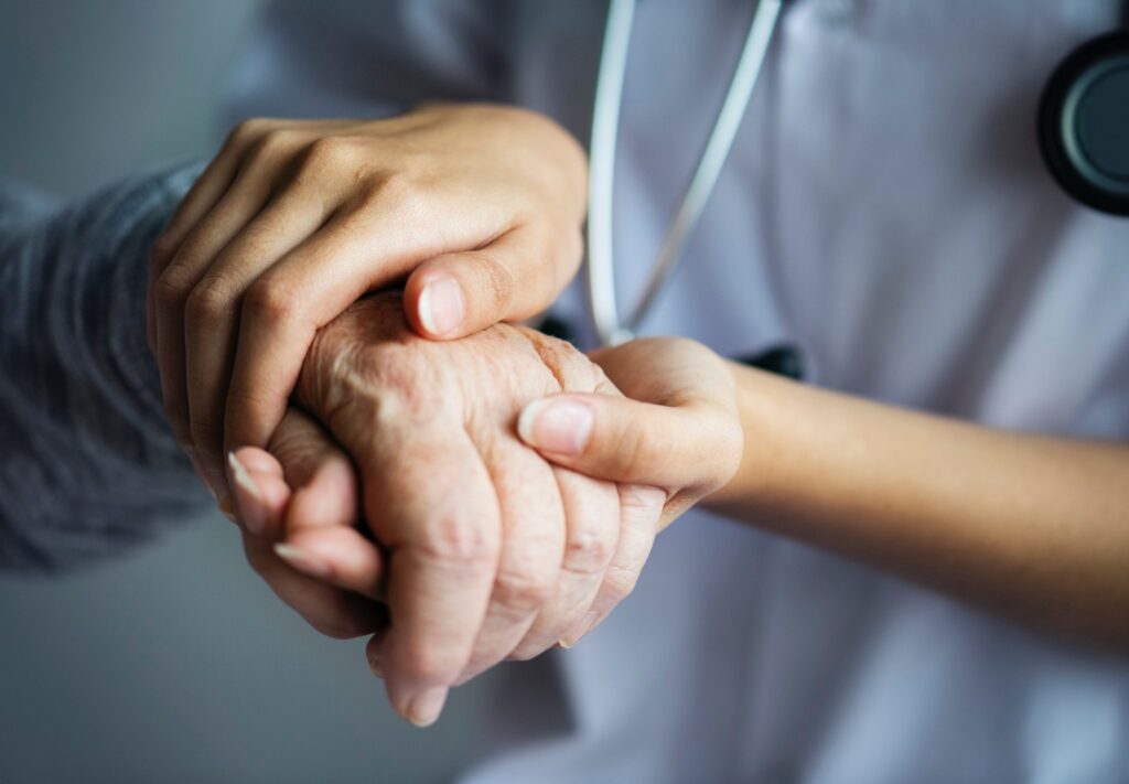 CNA who assists a patient with their daily living