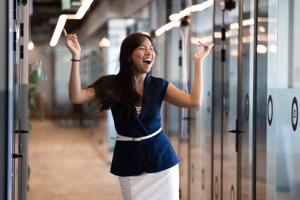 Woman is celebrating her successful interview, got her dream job