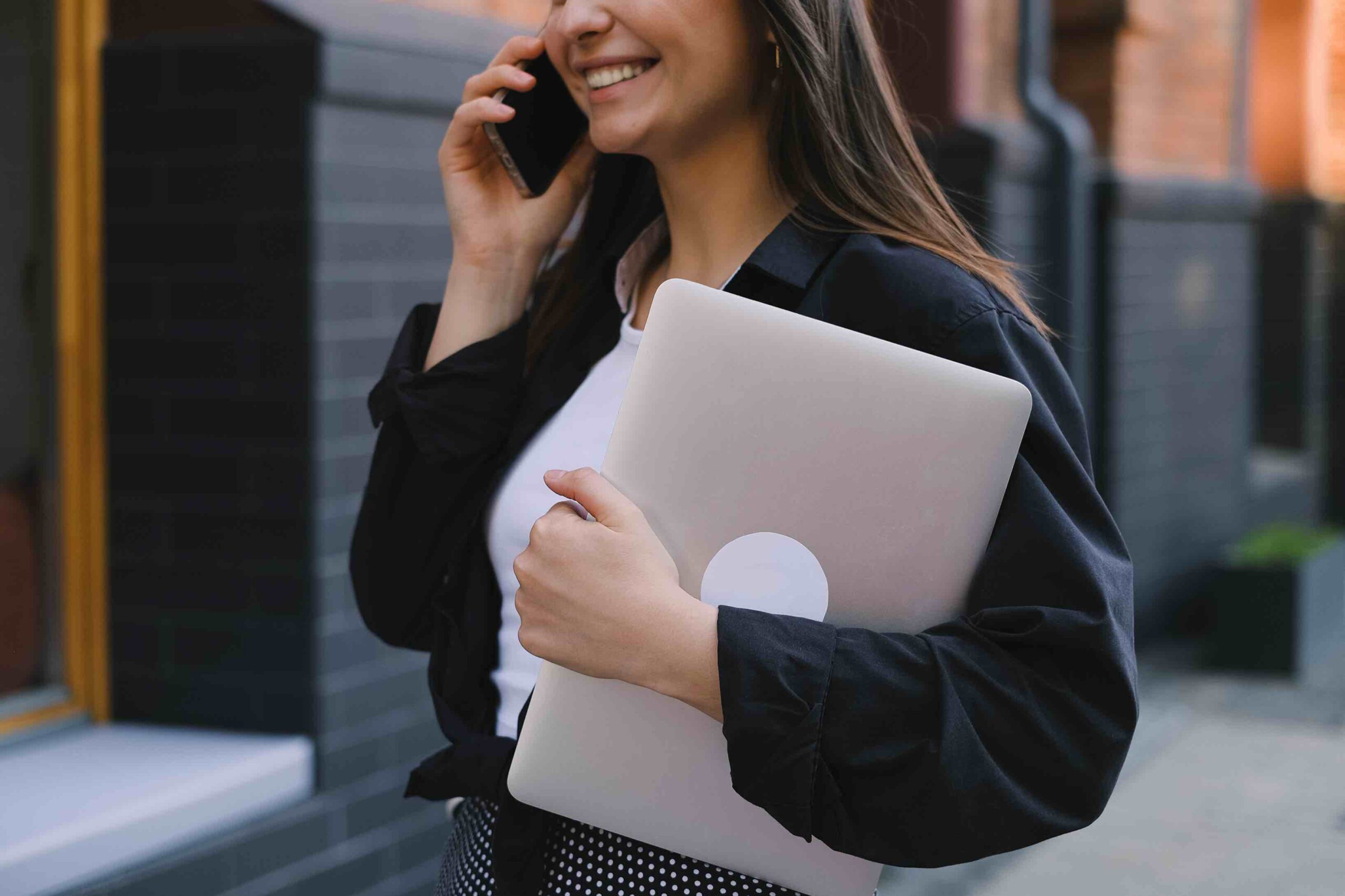 Young job seeker on phone who just recieved an inviation to an interview