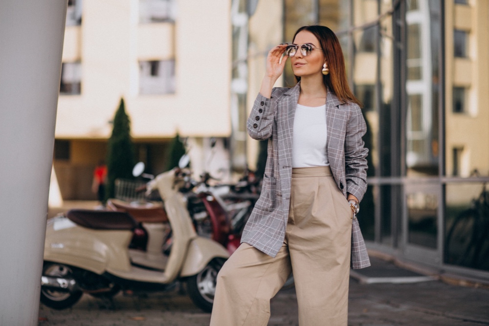Young woman in stylish business casual outfit