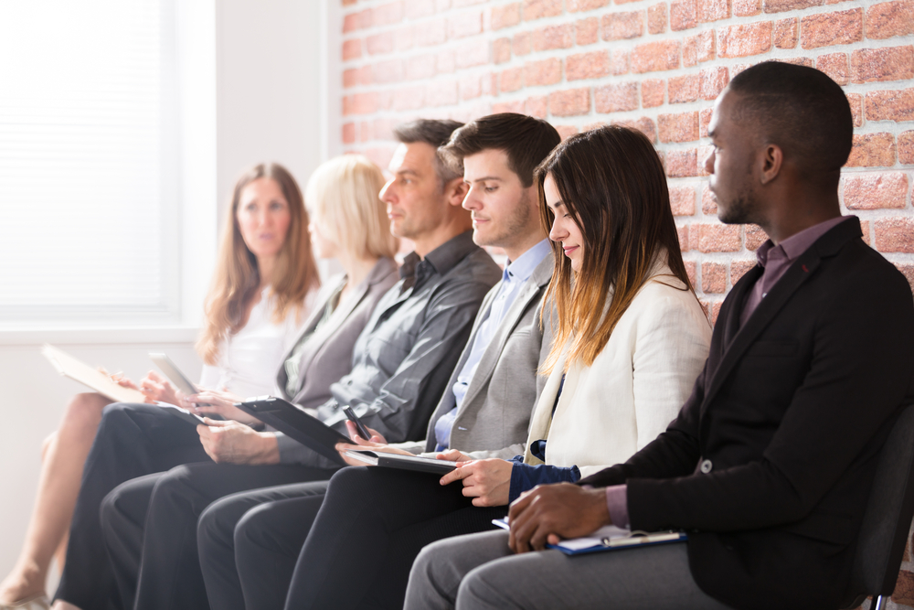 Group,Of,Diverse,People,Waiting,For,Job,Interview,In,Office