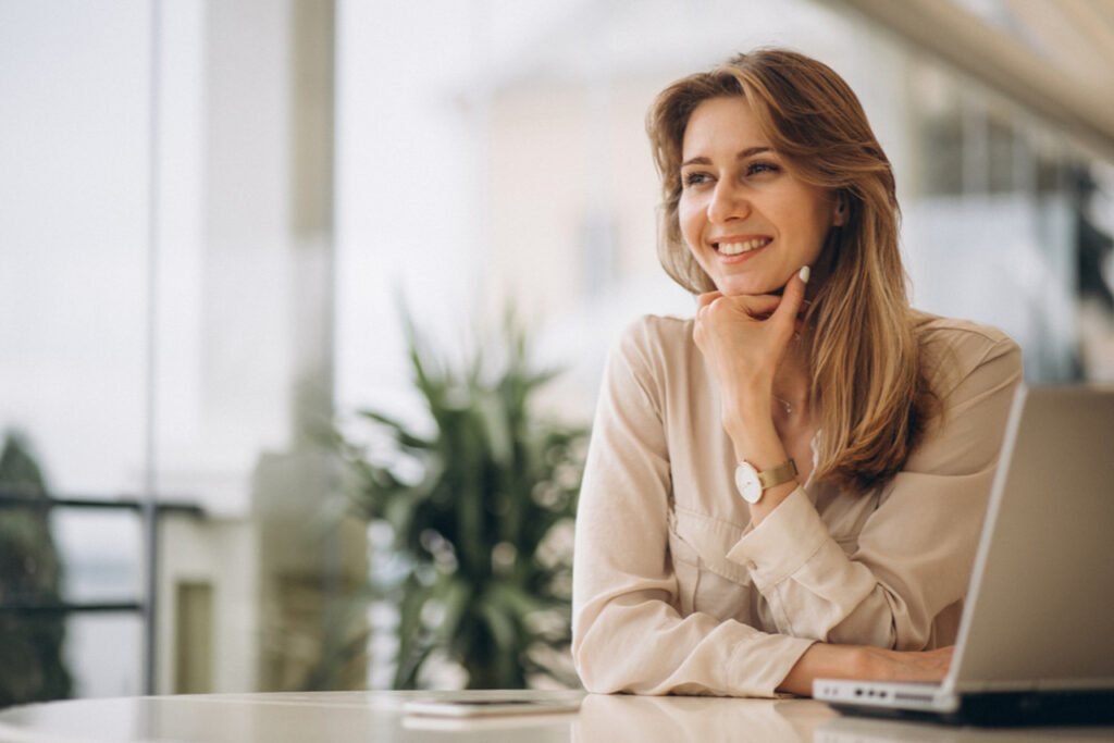 Happy businesswoman who has drafted a great reference letter