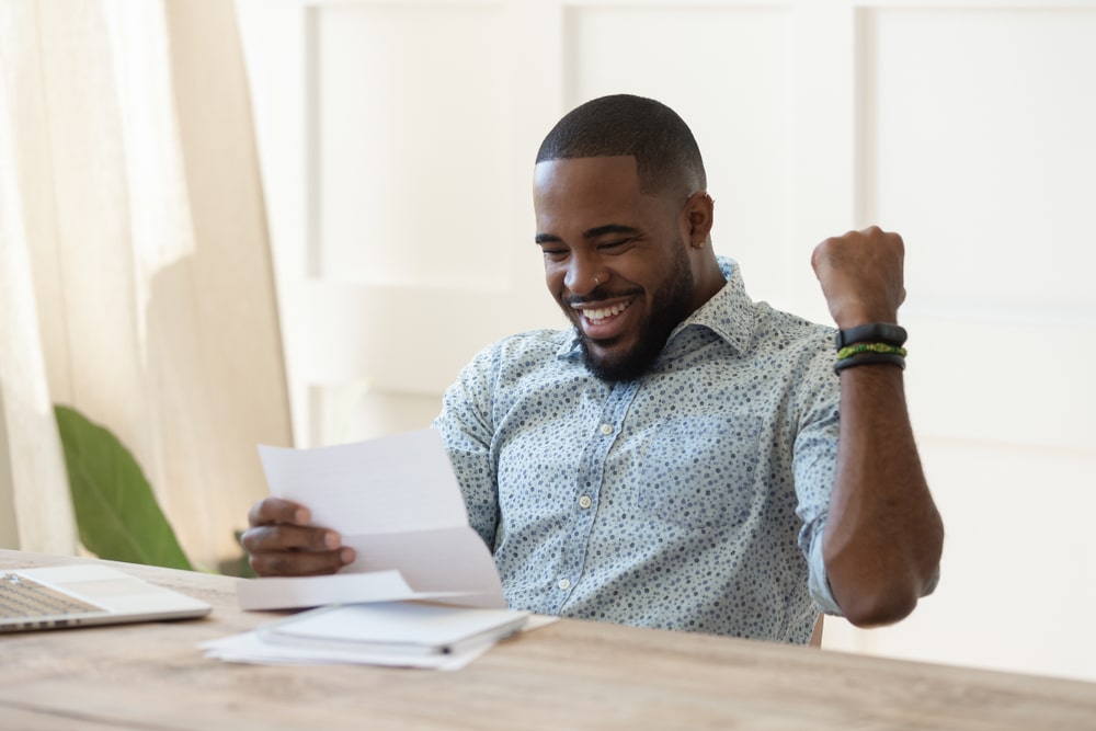 man is happy about his tax declaration