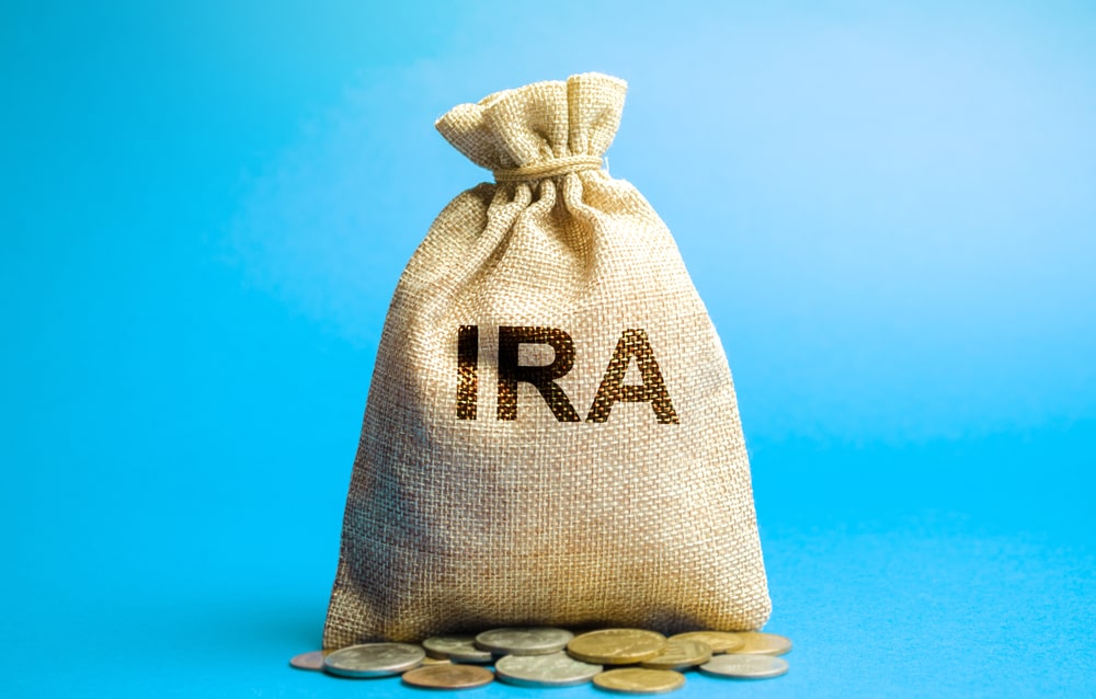 money bag with the word IRA on it