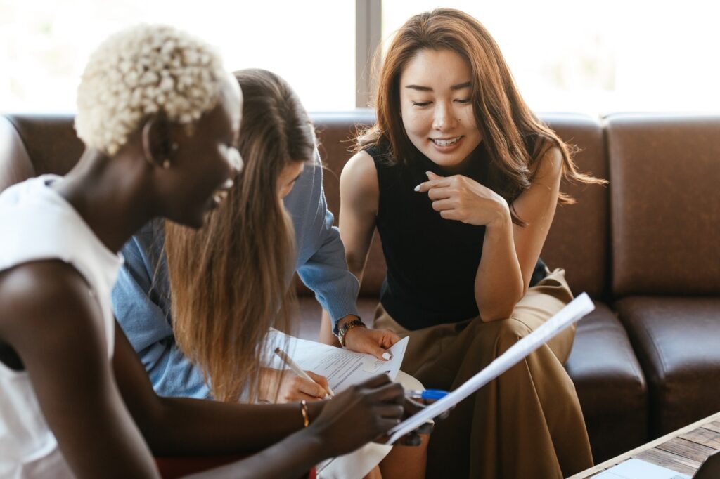 diverse female employees conversation