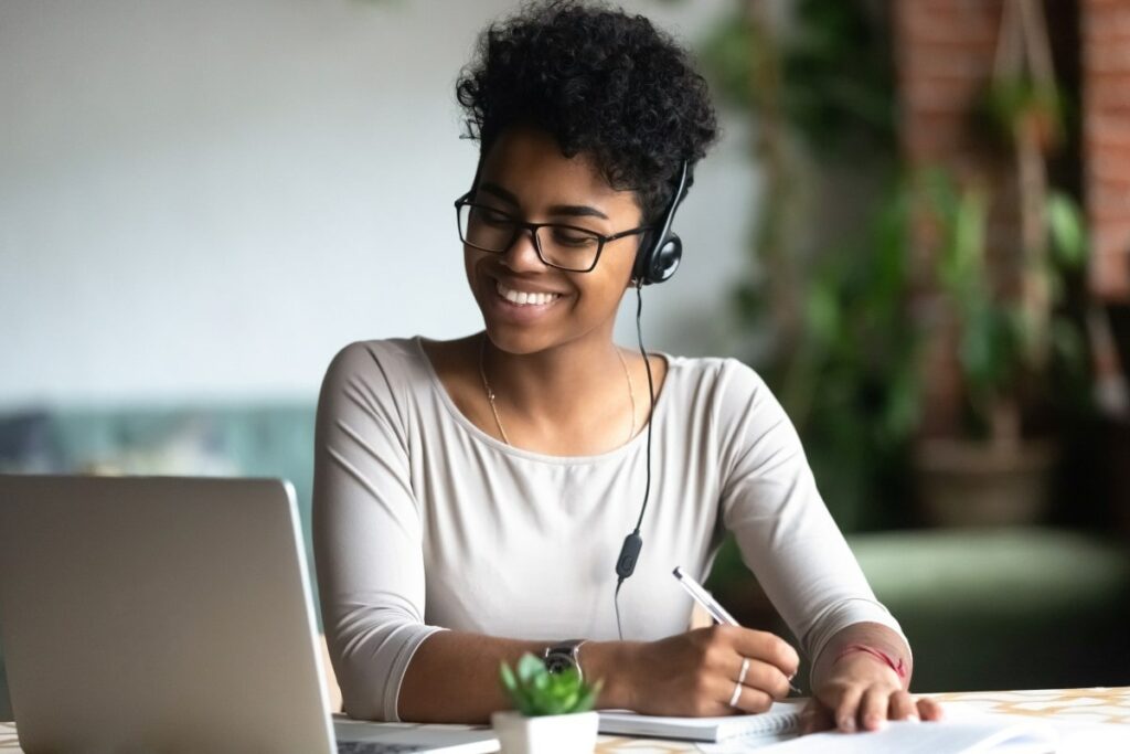 A woman is working remotely