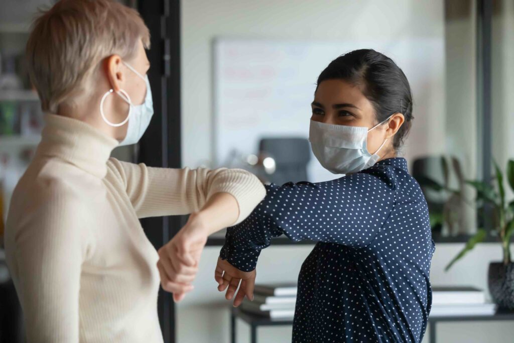 Two women, Corona, Wearing masks, Elbow Bump