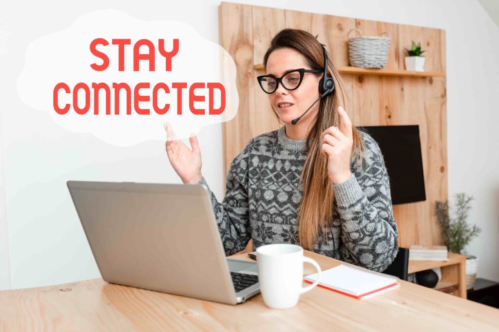 Woman, With headset, In front of laptop, In her living room, Home office, Stay connected